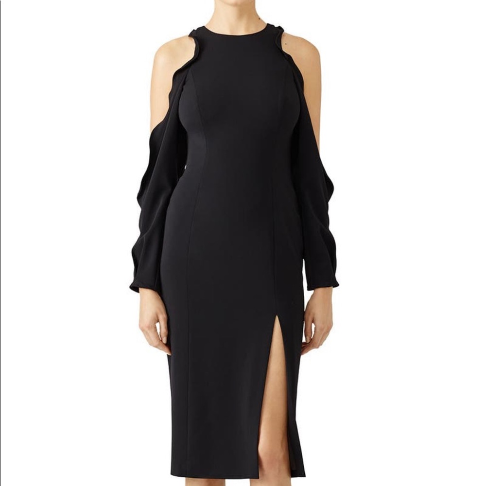 Black ruffled dress. Size 6 but not true to size. It’s smaller than a normal 6.